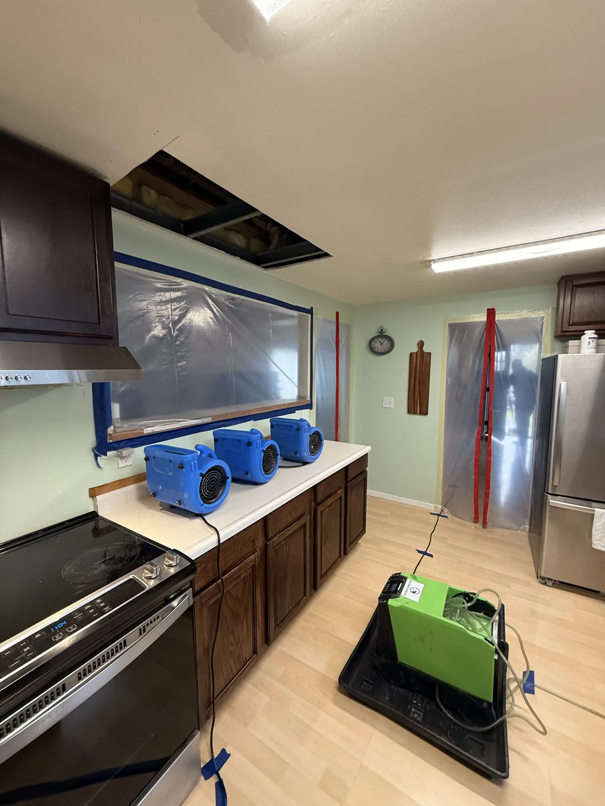 Everett: A targeted ceiling opening and drying equipment in the affected kitchen.