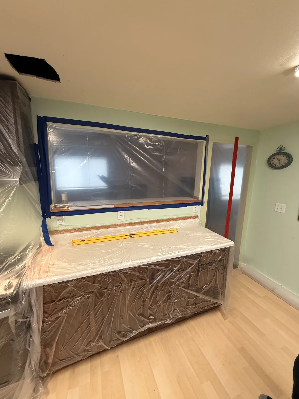 Everett: Containment protected the kitchen work area during the drying process.