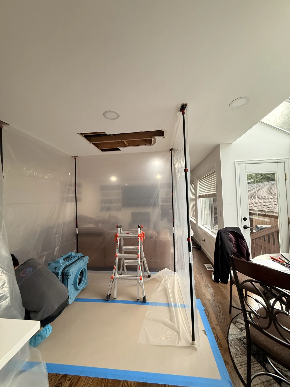 Medina: Containment and floor protection kept the drying work area separated from the rest of the room.