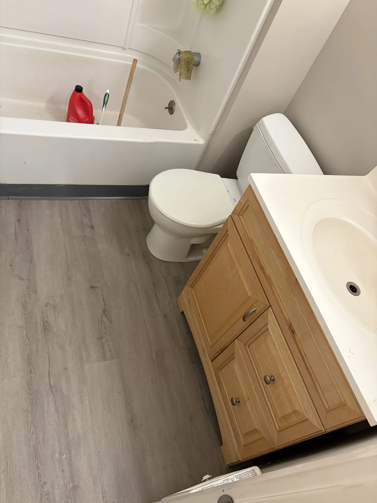 Seattle: The rebuilt bathroom with finished flooring and the toilet reinstalled.