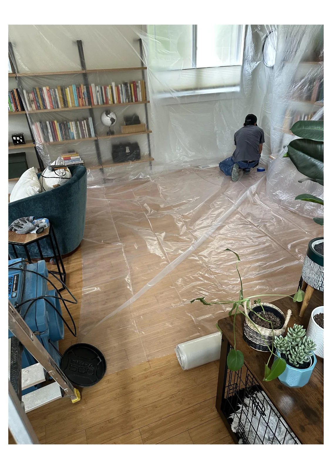 Woodinville: Containment and floor protection separated the restoration work area.